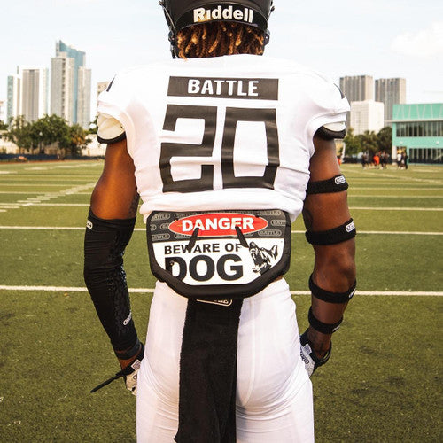 Football Player wearing a Battle Sports Beware of Dog Chrome Back Plate