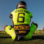 Caution Football Back Plate by Battle Sports